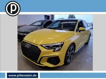 Bild eines gelben AUDI A3 Limousinen von vorne, mit Händlerlogo im Bild.