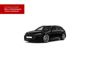 Das Foto zeigt einen schwarzen AUDI RS4 AVANT von der Seite. Es enthält eine Anzeige mit einem roten Hintergrund, die besagt: 'Fahrzeug im Vorlauf. Bitte vor Besichtigung Termin vereinbaren.'