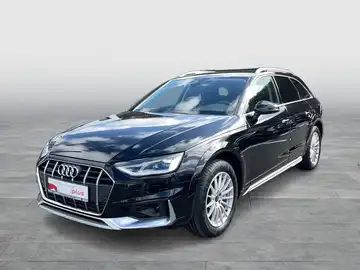 Das Bild zeigt einen schwarzen AUDI A4 ALLROAD von der Frontansicht. Es enthält ein Händlerlogo und markante Texteinblendungen.
