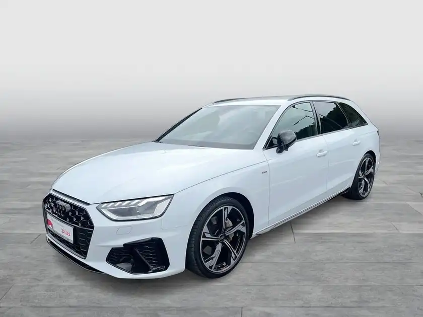 Das Bild zeigt einen weißen AUDI A4 AVANT von der Seite.