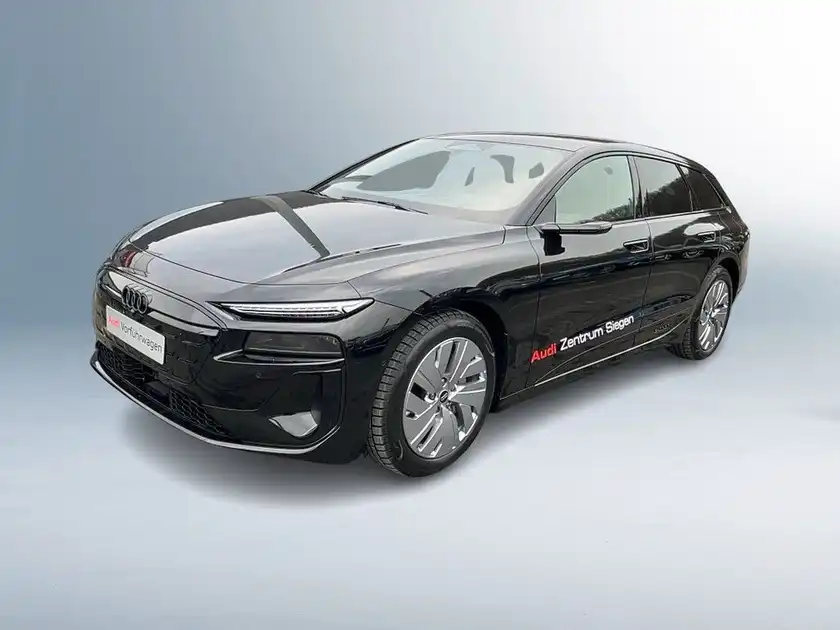 Das Bild zeigt einen schwarzen AUDI A6 AVANT E-TRON von der Seite, mit einem H ndlerlogo des Audi Zentrums Siegen und weiteren markanten Texteinblendungen.