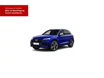 Das Bild zeigt einen blauen AUDI SQ5 von der Seite. In der oberen linken Ecke ist ein markantes Textfeld eingeblendet, das besagt: 'Fahrzeug im Vorlauf. Bitte vor Besichtigung Termin vereinbaren.'