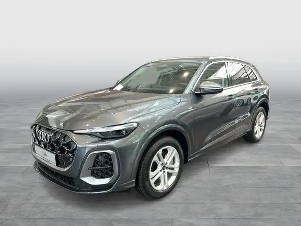 Das Bild zeigt einen Audi Q5 von der Seite in grauer Farbe.