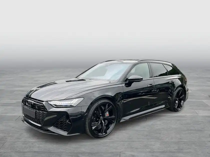 Das Bild zeigt einen schwarzen AUDI QUATTRO von der Seite.