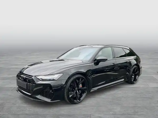 Das Bild zeigt einen schwarzen AUDI QUATTRO von der Seite.