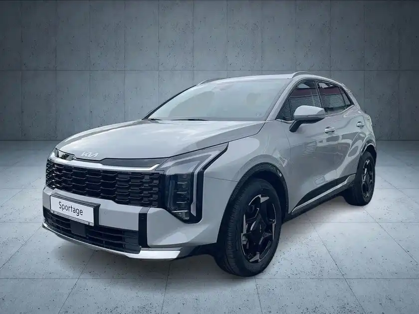 Das Bild zeigt einen grauen KIA Sportage von der Seite, mit markanter Texteinblendung für das Fahrzeugmodell.