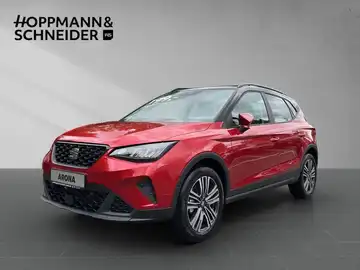 Das Bild zeigt einen roten SEAT ARONA von der Seite, mit dem Händlerlogo von Hoppmann & Schneider im oberen Bereich.