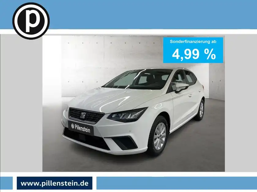 Das Bild zeigt einen weißen SEAT IBIZA aus der Frontansicht. Oben rechts ist eine Anzeige für Sonderfinanzierung ab 4,99 %. Das Händlerlogo 'Pillenstein' ist sichtbar.