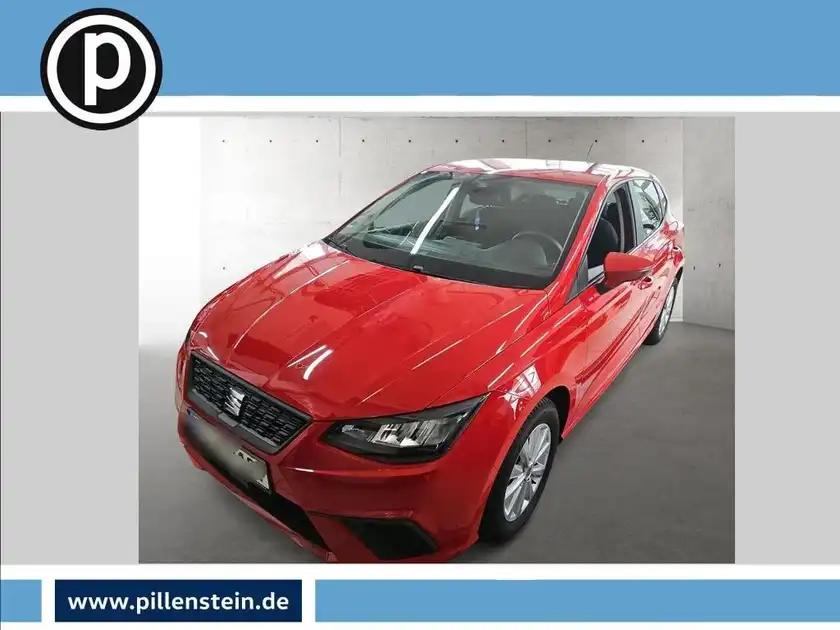 Das Bild zeigt einen roten SEAT IBIZA von vorne. Es enthält das Händlerinformationslogo.