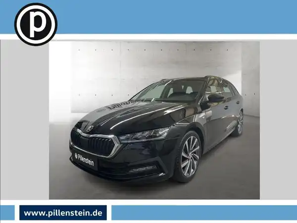 Das Bild zeigt einen schwarzen ŠKODA OCTAVIA von der Seite. Das Händlerschlogo ist im oberen linken Bereich zu sehen und es gibt einige markante Texteinblendungen auf dem Foto.