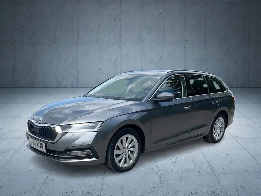 Das Bild zeigt einen ŠKODA OCTAVIA von der Seite in grau auf einem neutralen Hintergrund.