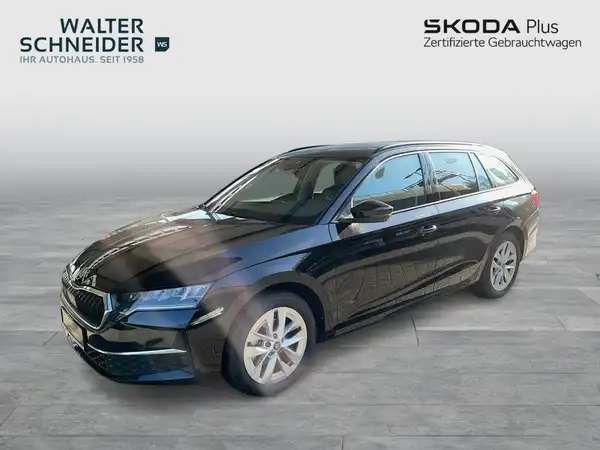 Ein Bild eines schwarzen ŠKODA OCTAVIA, aufgenommen von der Seite. Auf dem Foto ist das Händlerlogo "WALTER SCHNEIDER" sowie Textinformationen zu finden.