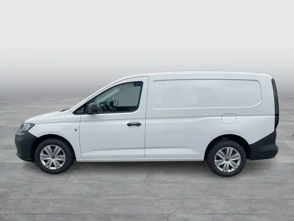 Das Bild zeigt einen weißen VW Caddy von der Seite.