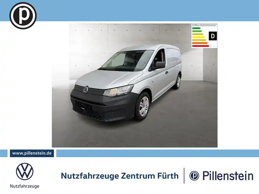 Das Bild zeigt einen silbernen VW Caddy von der Seite. Es enthält ein Händlerlogo und einige Texteinblendungen zur Energieeffizienz.