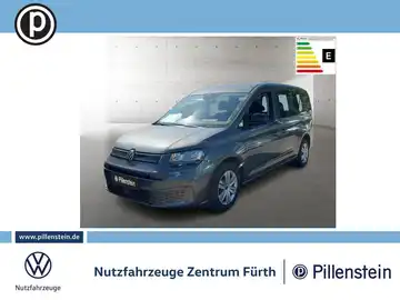 Das Bild zeigt einen grauen VW Caddy von vorne. Im Hintergrund sind Textinformationen und ein Händlerlogo von Pillenstein zu sehen.