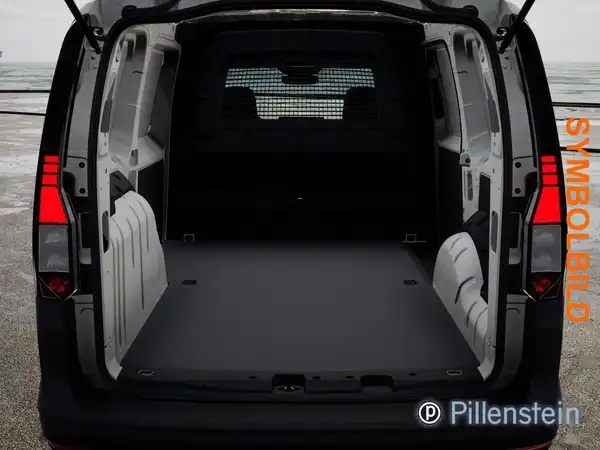 Innenaufnahme des VW Caddy, zeigt den Kofferraumbereich in schwarzer Ausführung mit sichtbaren Textankündigungen.