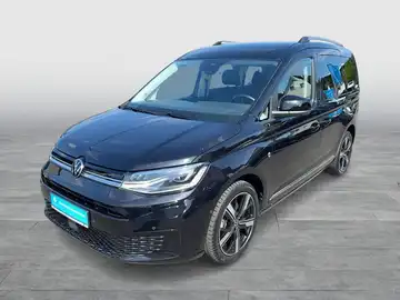 Das Bild zeigt einen schwarzen VW Caddy von der Seite. Im Bild ist das Händlerlogo von Walter Schneider zu sehen sowie markante Texteinblendungen.