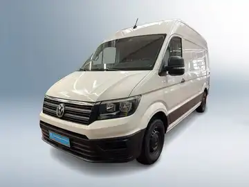 Das Bild zeigt einen weißen VW CRAFTER aus der Vorderansicht.