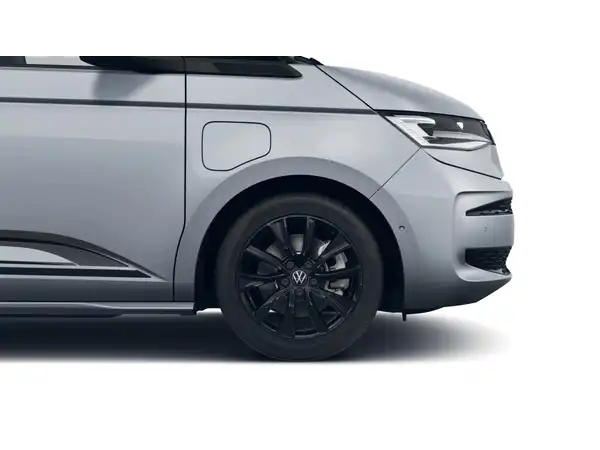 Das Bild zeigt einen VW Multivan Edition von der Seite, in grau lackiert.