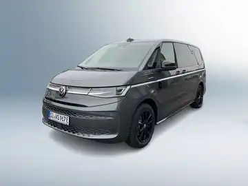 Das Bild zeigt einen VW Multivan in grauer Farbe, aufgenommen von der Seite.