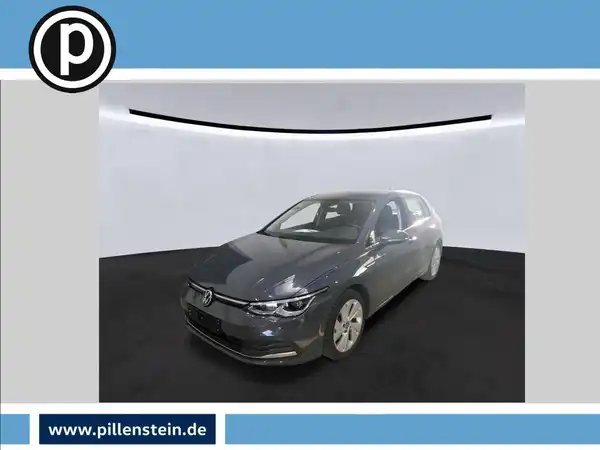 Das Bild zeigt einen grauen VW Golf aus der Frontansicht. Das Händlersymbol ist eingeblendet.