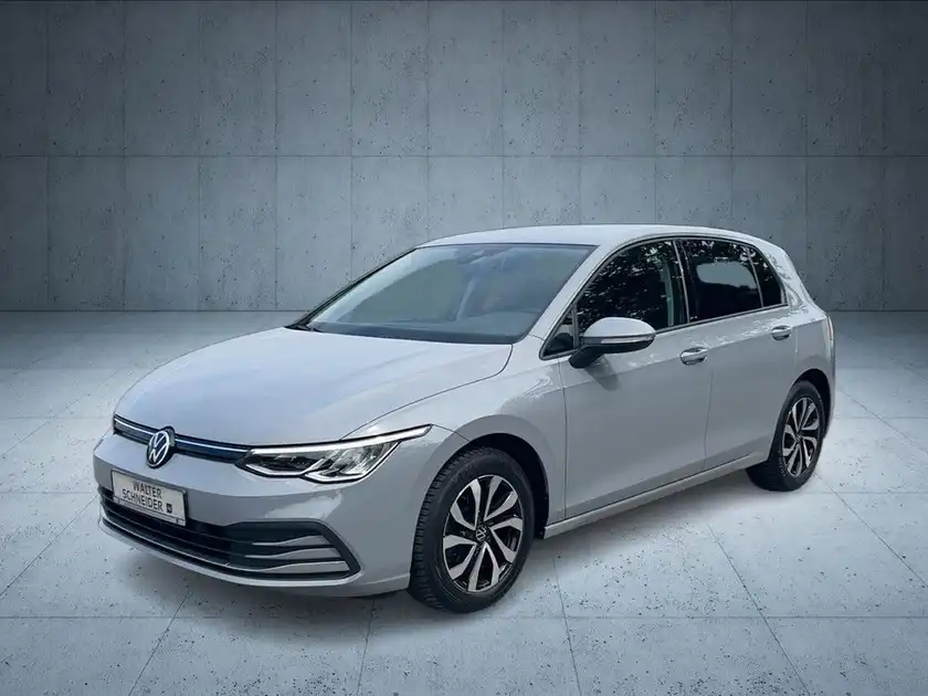 Das Bild zeigt einen grauen VW Golf aus der Seitenansicht.