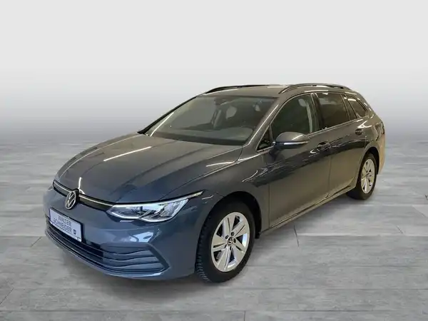 Das Bild zeigt einen VW GOLF VARIANT von der Seite in grauer Farbe.