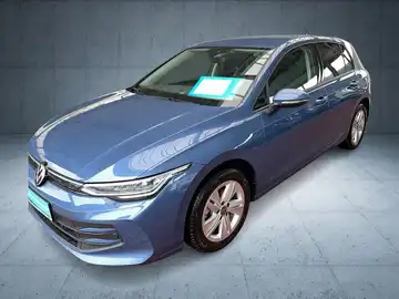 Das Bild zeigt einen blauen VW Golf aus seitlicher Perspektive. Am unteren Rand ist das Händlerlogo von Walter Schneider sichtbar, und es gibt markante Texteinblendungen.