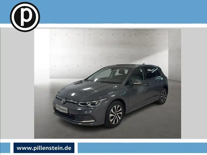 Das Bild zeigt einen grauen VW Golf aus der Seitenansicht. Es ist ein Händlerlogo eingeblendet, und das Foto enthält markante Texteinblendungen.