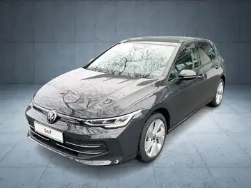 Das Bild zeigt einen grauen Volkswagen Golf aus der Frontalansicht. Im Hintergrund ist eine graue Wand zu sehen. Es gibt Texteinblendungen mit der Aufschrift 'Sofort verfügbar' und das Händlerlogo von Walter Schneider.