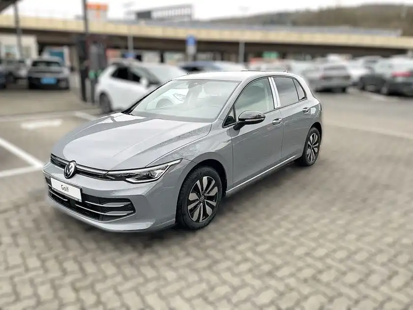 Das Bild zeigt einen grauen Volkswagen Golf von der Seite, aufgenommen auf einem Parkplatz. Das Händlerlogo "WALTER SCHNEIDER" und der Hinweis "Zertifizierte Gebrauchtwagen" sind im Bild zu sehen.