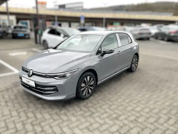Das Bild zeigt einen grauen Volkswagen Golf von der Seite, aufgenommen auf einem Parkplatz. Das Händlerlogo "WALTER SCHNEIDER" und der Hinweis "Zertifizierte Gebrauchtwagen" sind im Bild zu sehen.