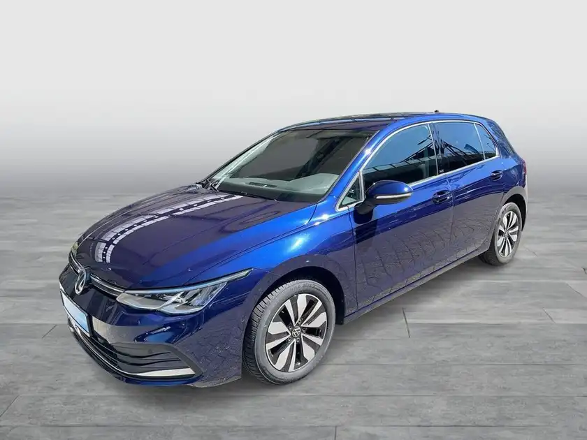 Das Bild zeigt einen blauen VW Golf in seitlicher Ansicht.