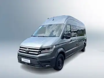 Ein seitliches Bild eines silbernen VW GRAND CALIFORNIA 680, mit dem Händlerinformationslogo im unteren Bereich.