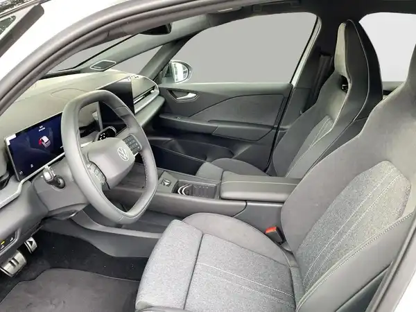 Das Bild zeigt den Innenraum eines VW ID.3. Der Innenraum ist in Grau gehalten.