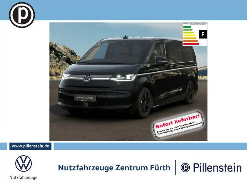 Das Bild zeigt einen schwarzen VW Multivan, aufgenommen von vorne. Das Händellogo ist eingeblendet und es gibt markante Texteinblendungen auf dem Bild.