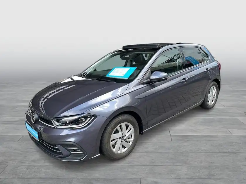 Das Bild zeigt einen grauen VW Polo von der Seite. Das Händlerlogo „WALTER SCHNEIDER“ ist eingeblendet. Außerdem gibt es markante Texteinblendungen auf dem Bild.