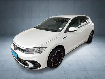 Das Bild zeigt einen weißen VW Polo aus der Seitenansicht. Es handelt sich um ein Fahrzeugbild. Das Händlerlogo von Walter Schneider ist eingeblendet und es gibt zusätzliche markante Texteinblendungen.