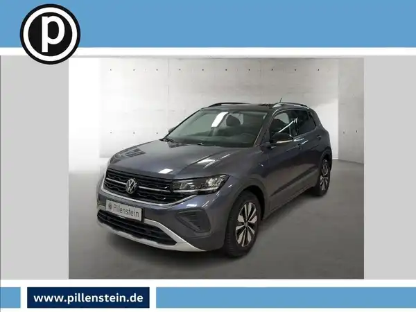 Das Bild zeigt einen grauen Volkswagen T-CROSS von vorne, mit einem Händlerlogo und markanten Texteinblendungen.