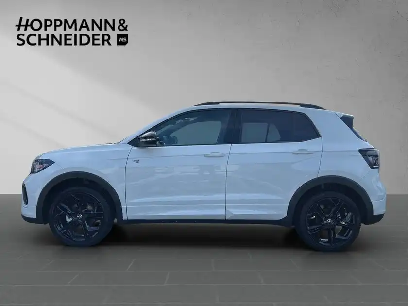 Das Bild zeigt einen weißen VW T-CROSS von der Seite. Im Bild ist das Händlerlogo 'HOPPMANN & SCHNEIDER' eingeblendet.