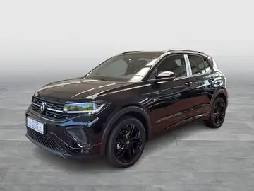 Das Bild zeigt einen schwarzen VW T-Cross aus einer Seitenansicht.