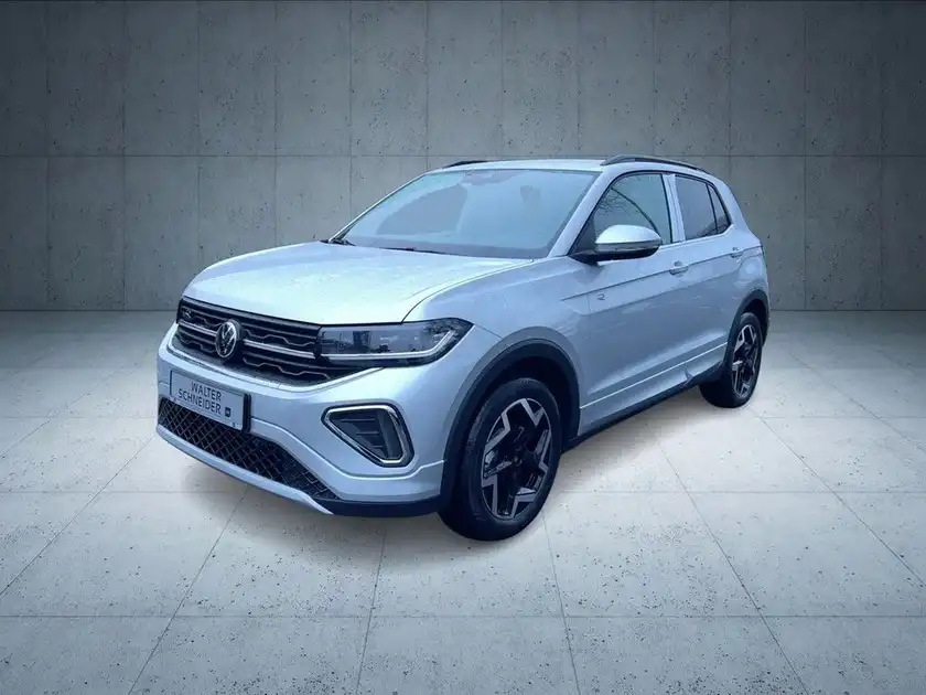 Das Bild zeigt einen VW T-CROSS aus der Seitenansicht in blauer Farbe auf einem neutralen Hintergrund.