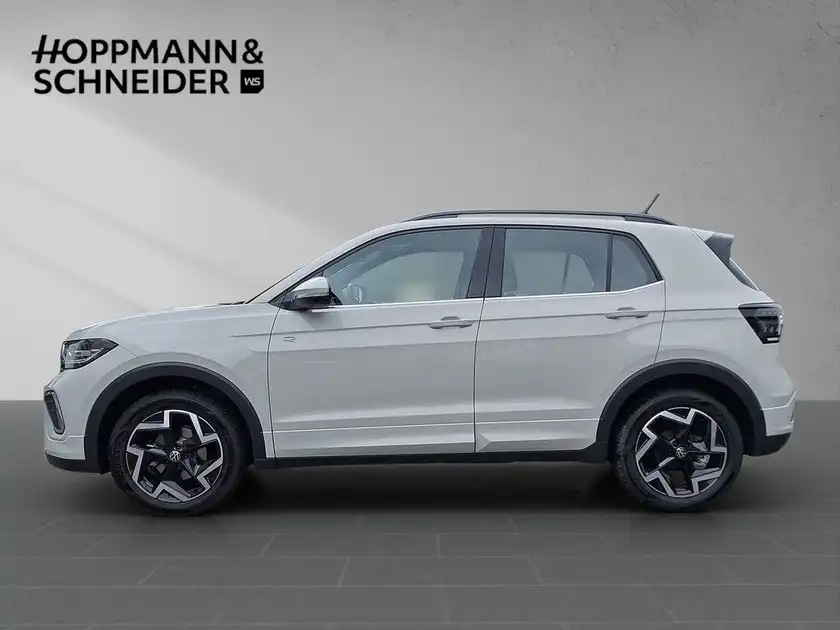 Das Bild zeigt einen weißen VW T-CROSS von der Seite. Im oberen Bereich des Bildes ist das Händlerlogo von Hoppmann & Schneider zu sehen.