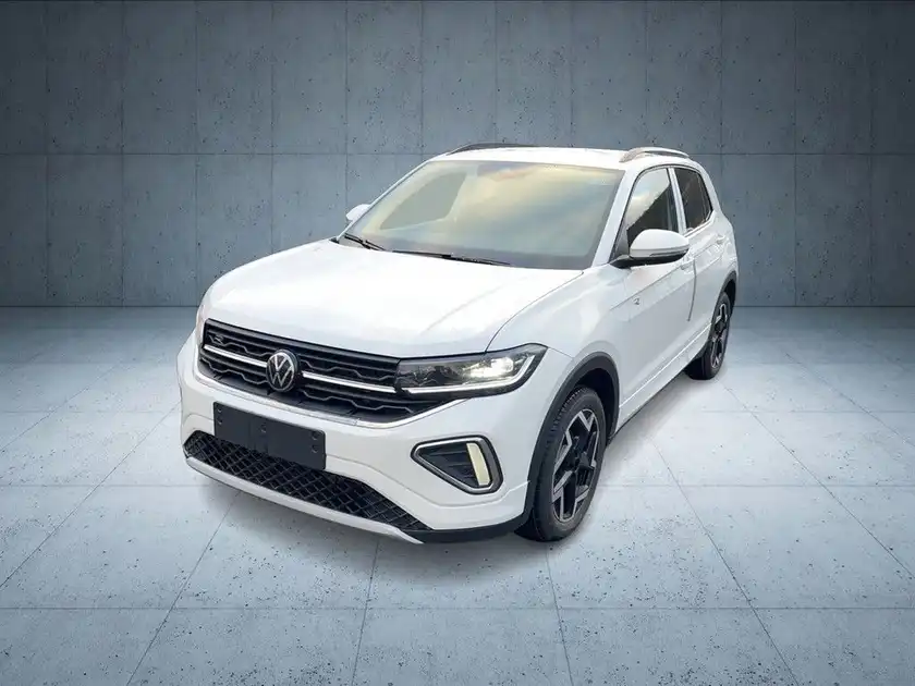 Das Bild zeigt einen weißen VW T-CROSS aus der Frontalansicht.