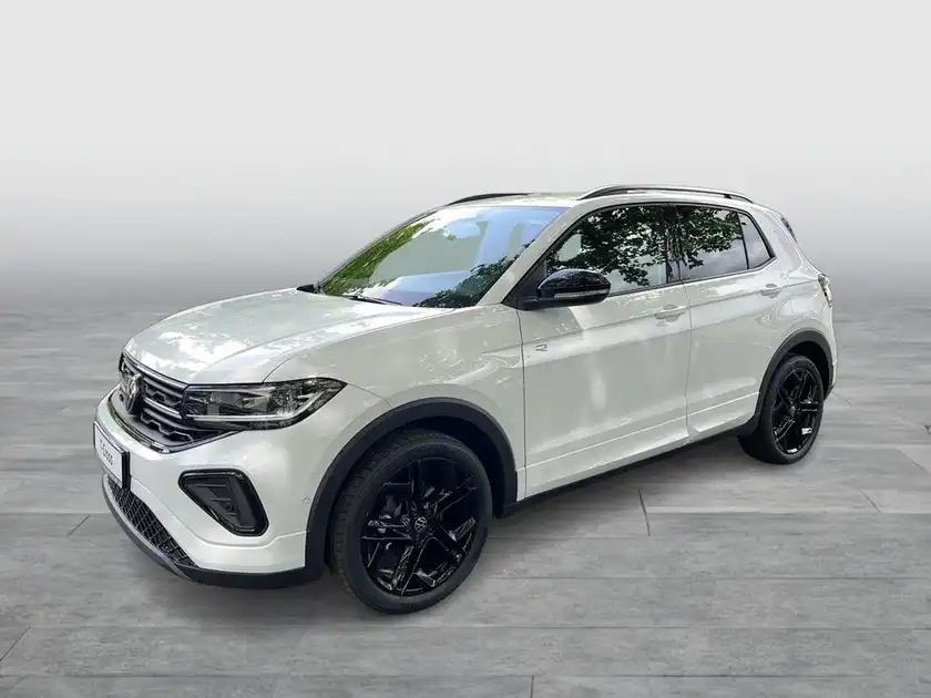 Das Bild zeigt einen weißen VW T-CROSS, aufgenommen von der Seite.