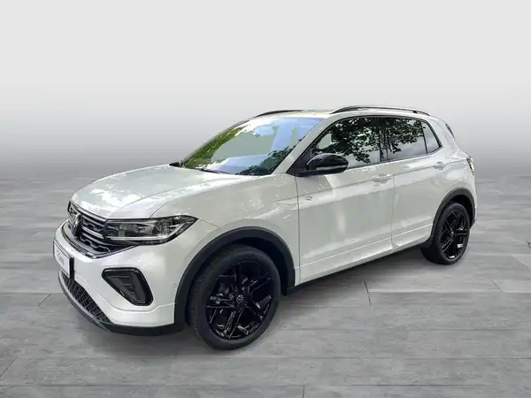 Das Bild zeigt einen weißen VW T-CROSS, aufgenommen von der Seite.