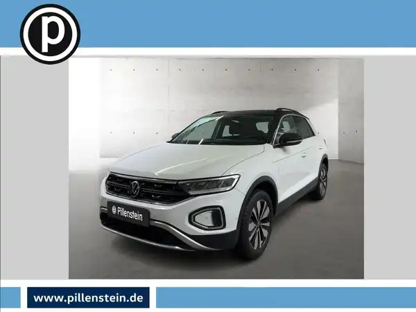 Das Bild zeigt einen weißen Volkswagen T-ROC von vorne, mit dem Händlerlogo unten und markanten Texteinblendungen.