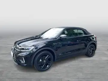 Das Bild zeigt einen schwarzen VW T-ROC Cabriolet von der Seite. Es handelt sich um ein Fahrzeugbild.