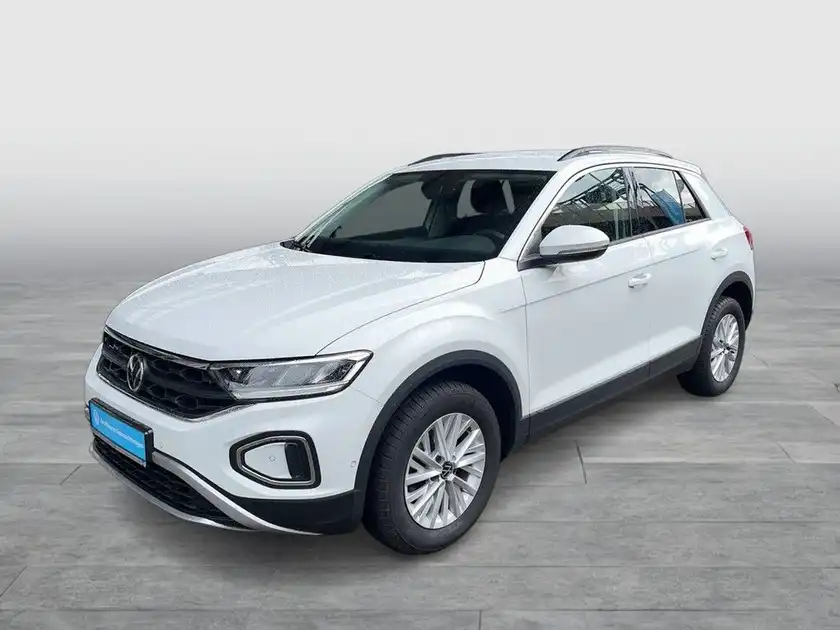 Das Bild zeigt einen weißen VW T-ROC von der Seite.