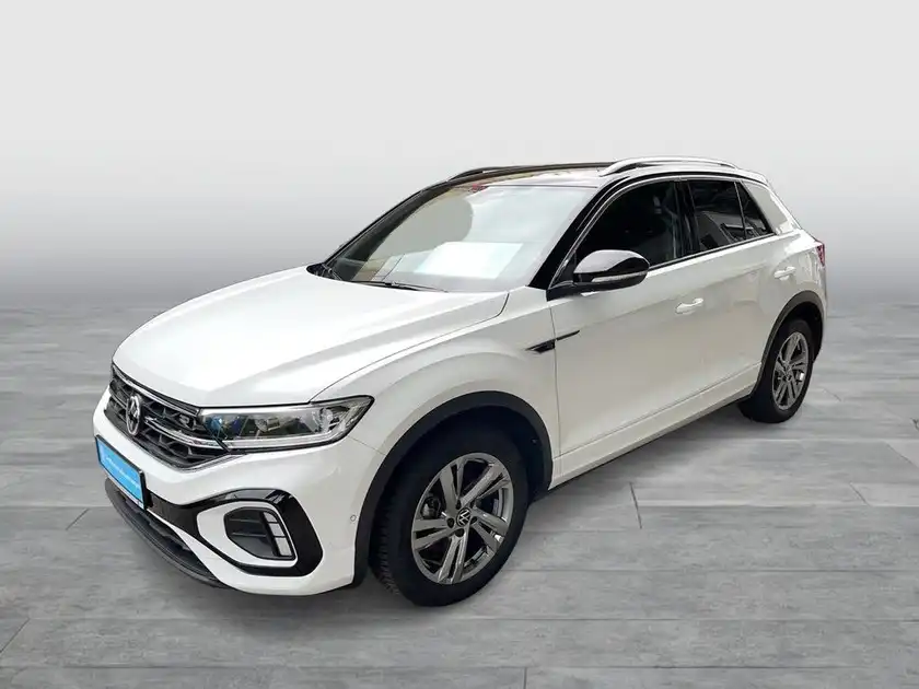 Das Bild zeigt einen VW T-ROC aus der Frontalansicht in der Farbe Weiß.